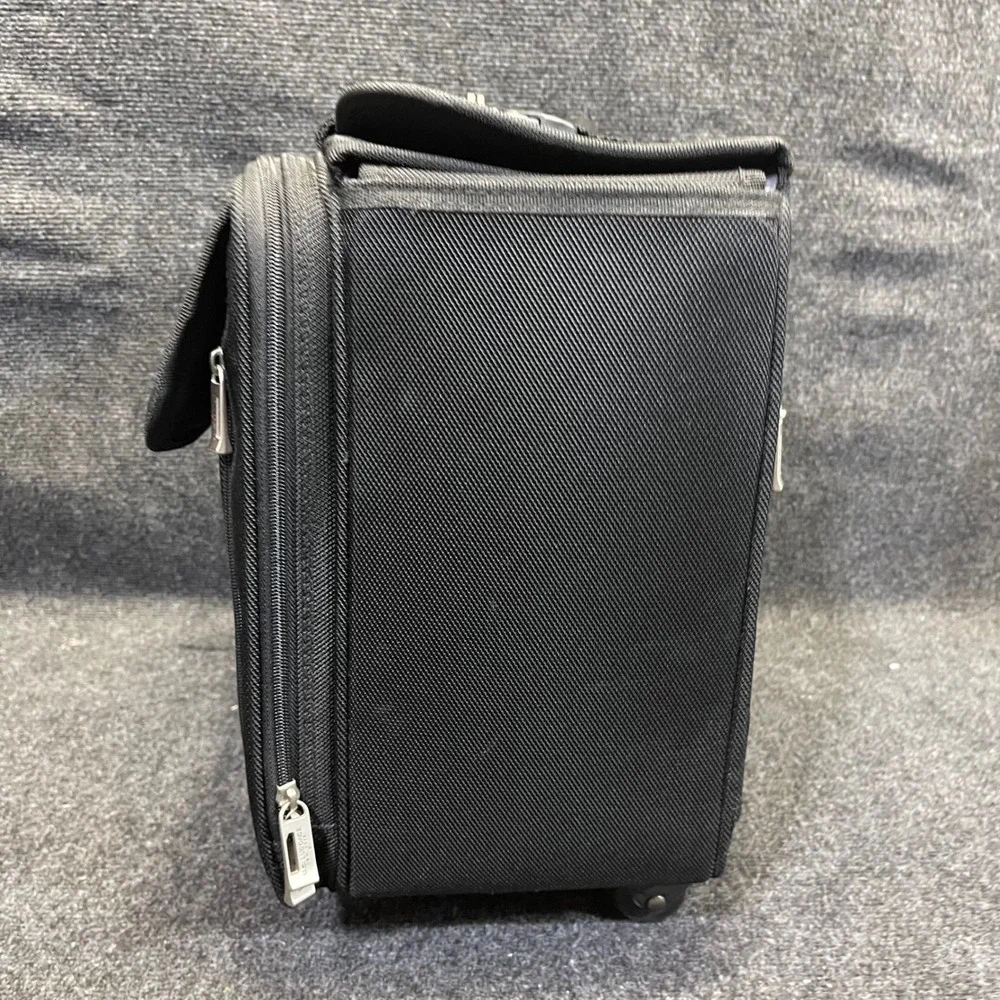 US Luggage New York Black Ballistic Nylon Rolling Catalog Case Wheeled Briefcase